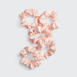 KITSCH Satin Sleep Scrunchies in Blush — product shot of blush pink satin sleep scrunchie — silky satin won't crimp or agitate hair while you sleep