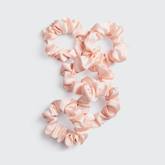 KITSCH Satin Sleep Scrunchies in Blush — product shot of blush pink satin sleep scrunchie — silky satin won't crimp or agitate hair while you sleep