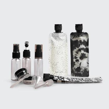 Kitsch Ultimate Travel Bottles 11pc Set in Black & Ivory shown packed in toiletry bag