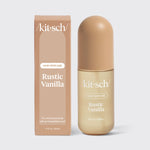 Kitsch Rustic Vanilla Hair & Body Perfume Mist bottle on a warm neutral background