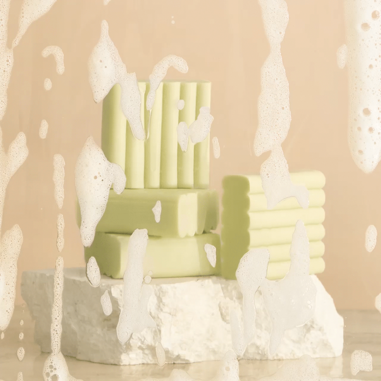 KITSCH Glycolic Acid Resurfacing Face and Body Wash — animated product shot — Formulated with 0.7% glycolic acid to promote brighter, more even-looking skin — dual-use for face + body