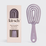 Soft Violet Kitsch Detangling Flexi Brush Mini on a soft neutral background