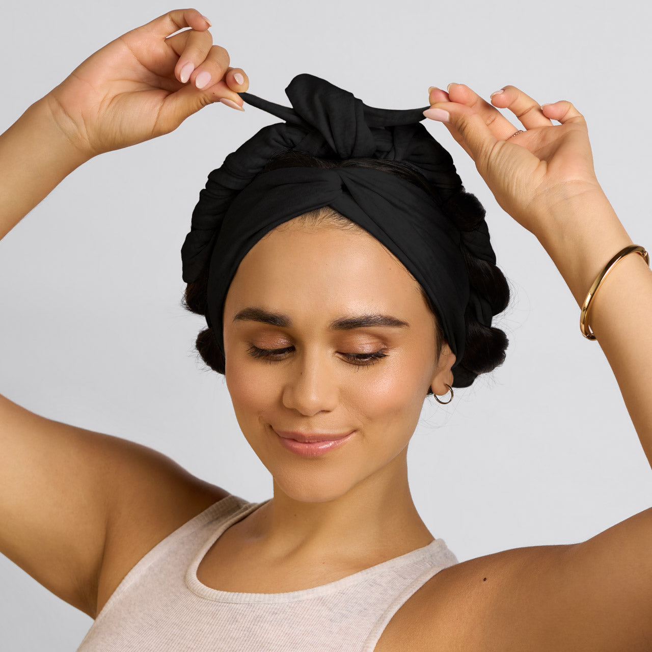 KITSCH Set & Flow Active Headband in Black — model wearing black set & flow headband as a sleep style — wakes up to defined, frizz-free hair in the morning