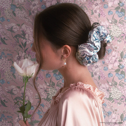 KITSCH Bridgerton x Kitsch Satin Pillow Scrunchies® in Toile in Bloom — model styling hair with Toile in Bloom pillow scrunchie — silky satin is gentle on hair, no creasing or breakage
