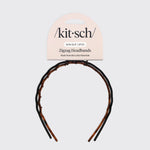 Detail close-up of Kitsch Zig Zag Headbands showing the classic black and tortoiseshell finish