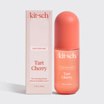 Kitsch Tart Cherry Hair & Body Perfume Mist bottle on a soft pink background