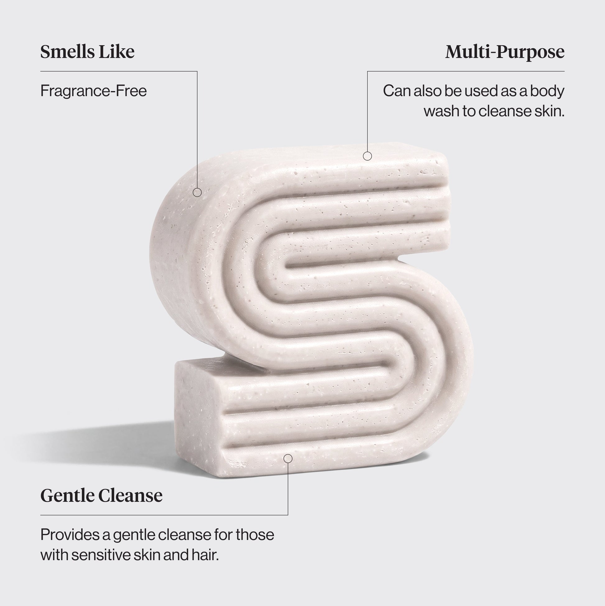 White kitsch ultra sensitive shampoo and body wash bar with text describing its features on a light gray background. Features include: smells like - fragrance free, multi-purpose - can be used as a body wash to cleanse skin, and gentle cleanse - provides a gentle cleanse for those with sensitive skin and hair