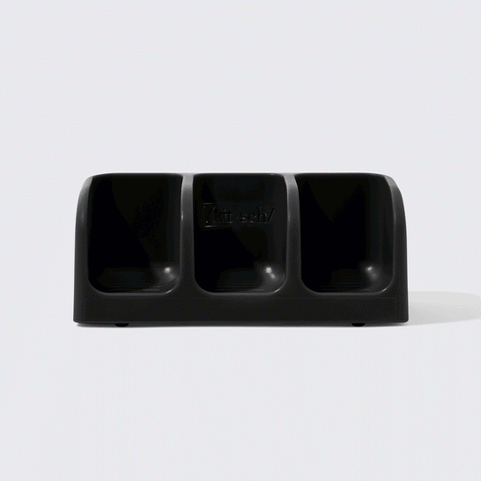 BuildYourOwnBundle-SoapDish-Black GIF showing dry bars being stacked on the soap dish.