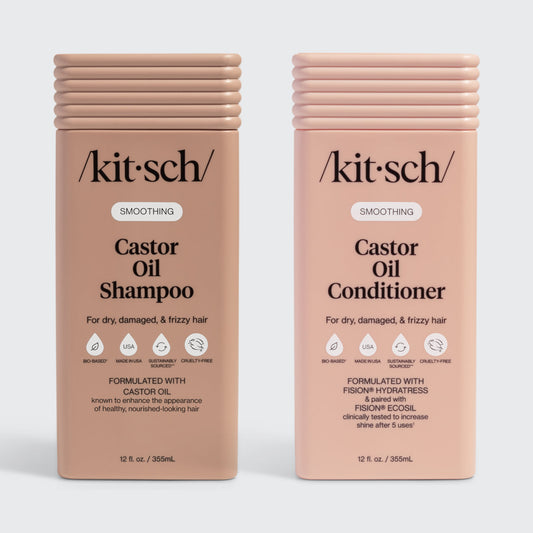 Two bottles of Kitsch Castor Oil Shampoo and Conditioner on a white background