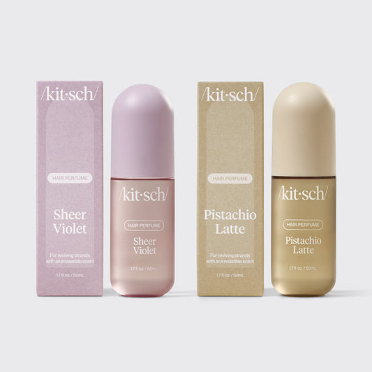 Kitsch Farmers Market Sunday Duo – Sheer Violet and Pistachio Latte hair perfumes paired on a soft floral background