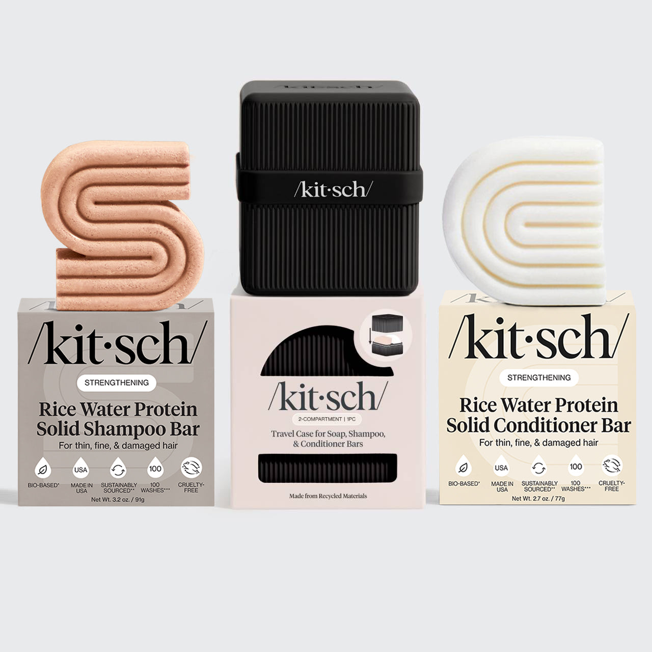 KITSCH Build Your Own FREE Travel Case Bundle — flat lay showing Rice Water shampoo and conditioner bars with black travel case — sustainable bottle-free beauty routine — compact 2-compartment case holds both bars